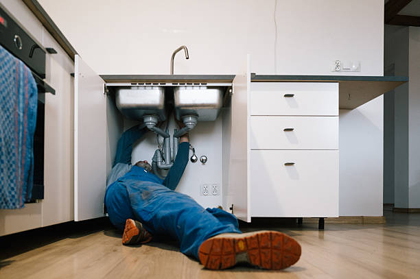 Professional Drain Cleaning technician working in Queens Village, NY